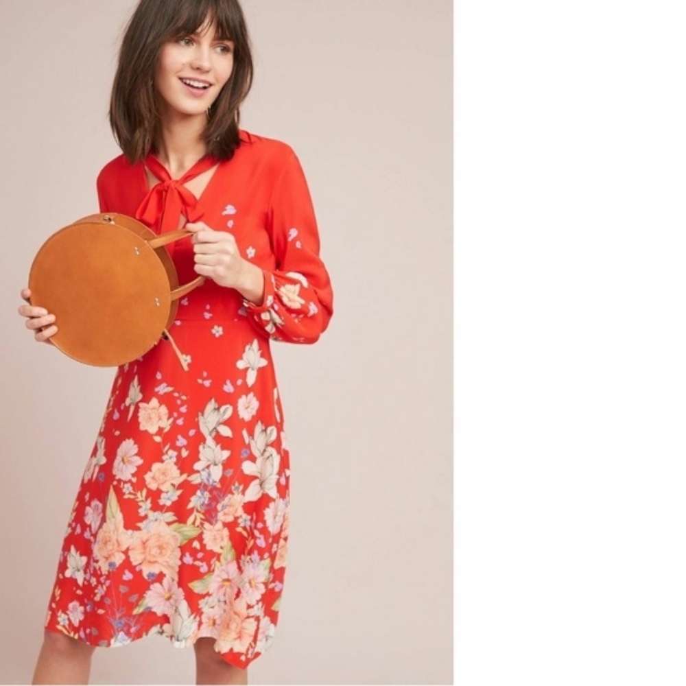 Silk dress with Lilly pattern & keyhole neck.